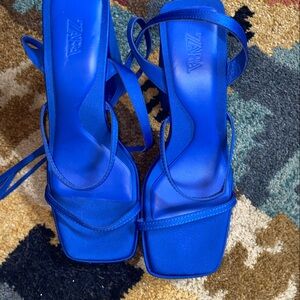 blue strappy square-toe heeled sandals from Zara.